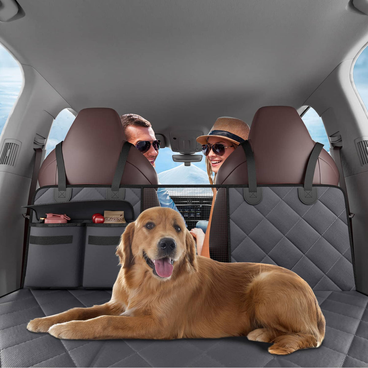 Gray quilted dog back seat cover fitted across rear seats with tether points