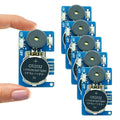 Cricket noise maker prank module: blue board, black speaker, CR2032 coin battery