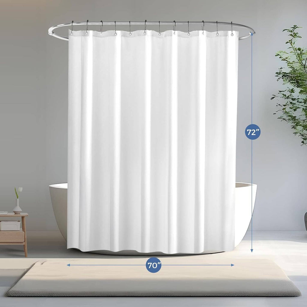 White shower curtain liner hanging from a ceiling rod with evenly spaced rings