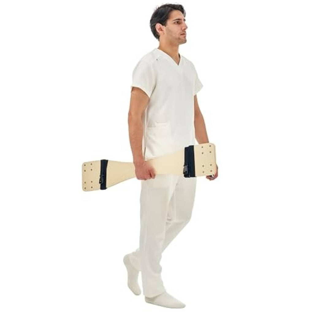 Beige massage table cart kit with end panels and black strap bands, carried by person