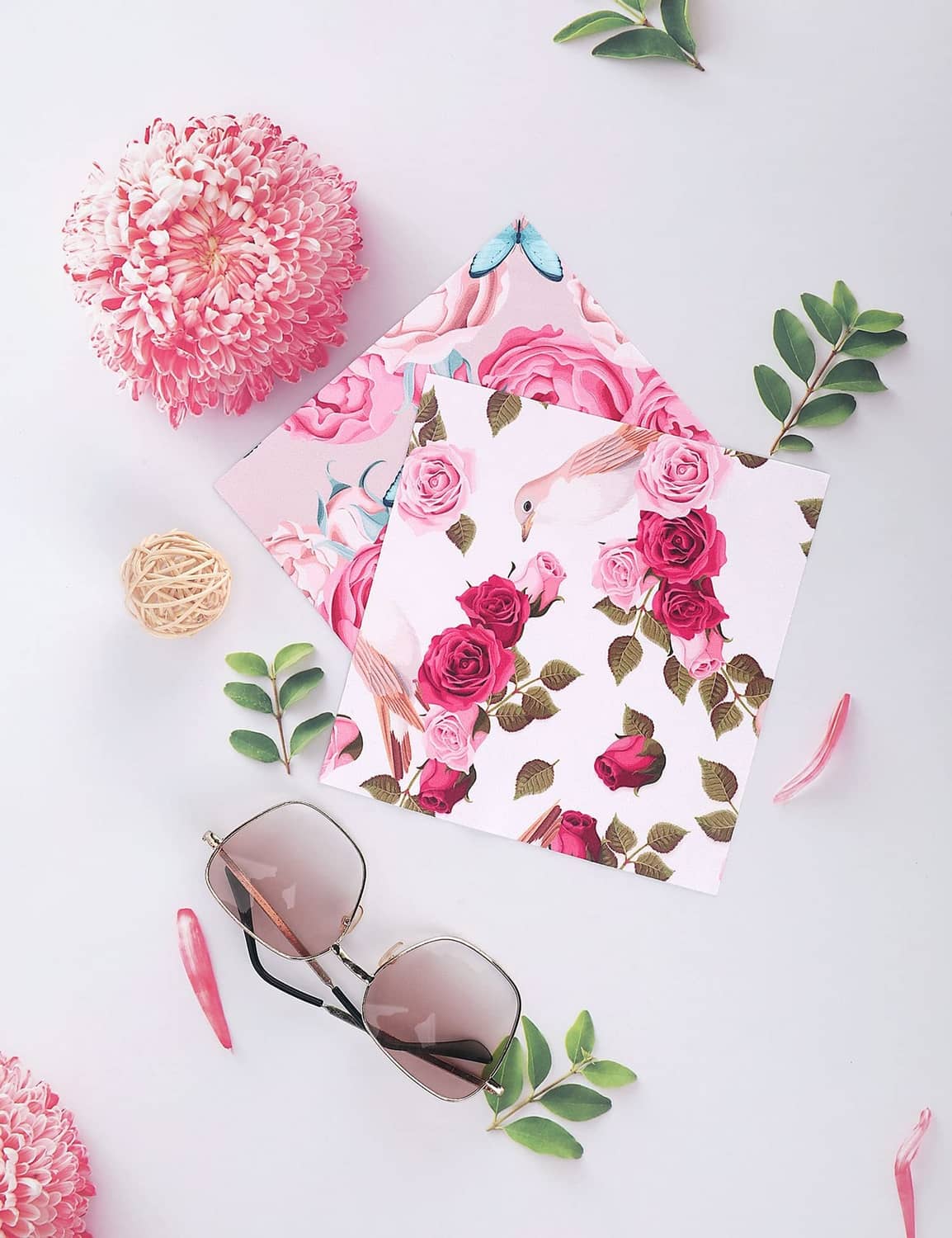 Floral cleaning cloth set with pink peonies and butterflies, with eyeglasses shown