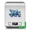 Digital kitchen scale with stainless platform, LCD readout, and blueberries on top