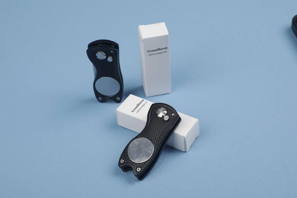 Foldable golf divot repair tool with ball marker in box package