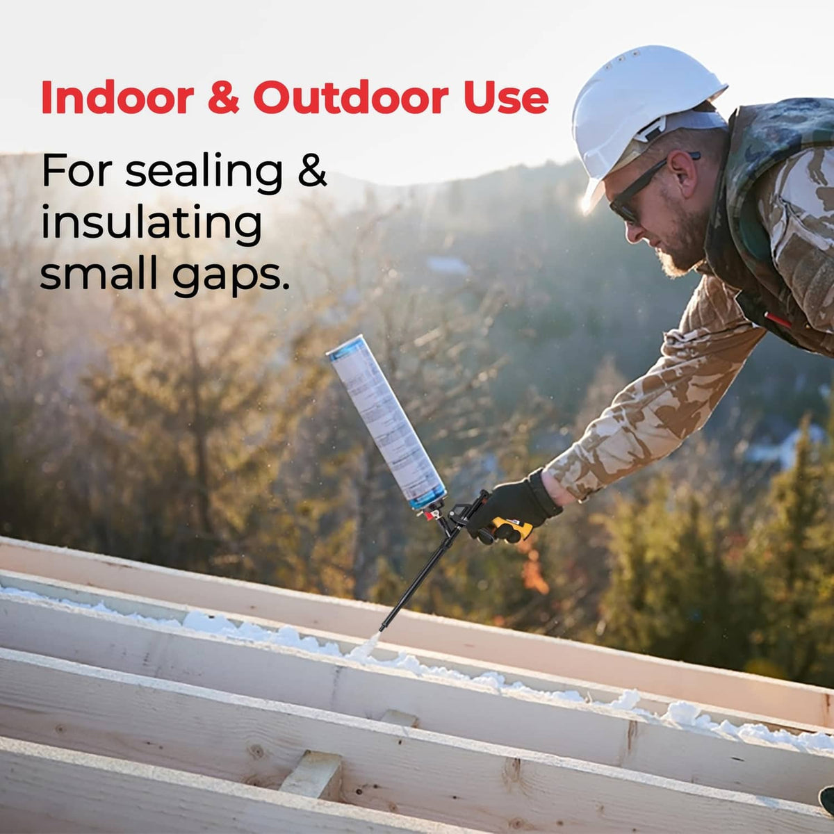 Spray foam insulation gun applying foam seal outdoors along a roof or siding gap