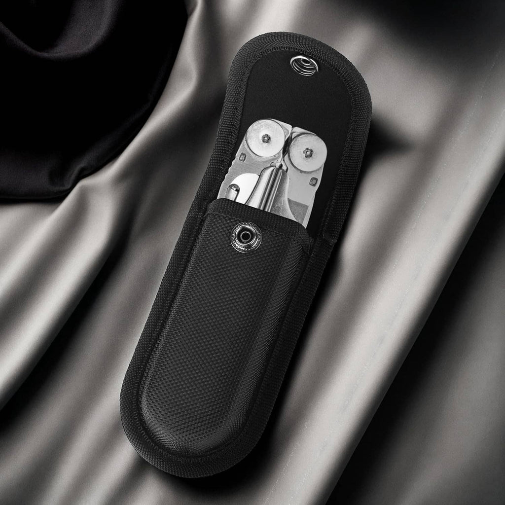 Black nylon knife sheath pouch with open top and snap hardware detail.