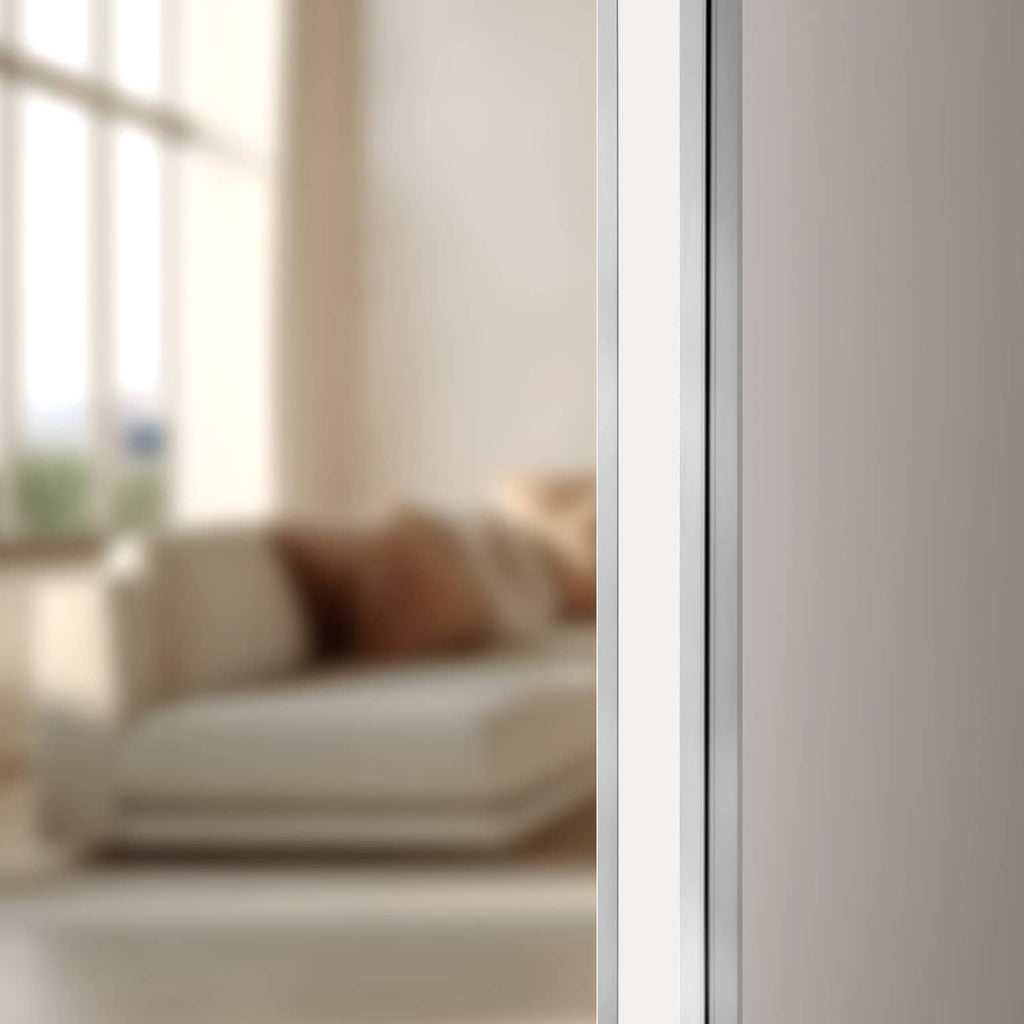 Stainless steel wall corner protector on a vertical wall edge, self-adhesive