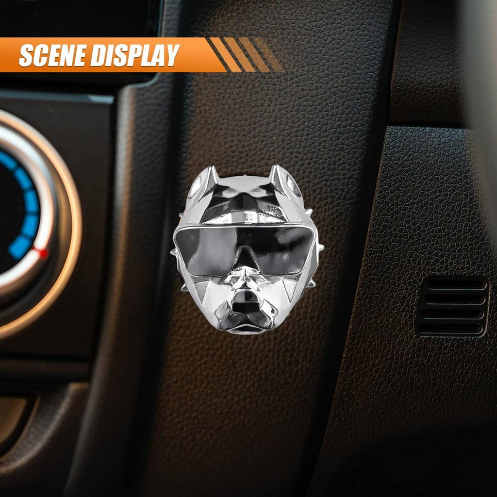 Silver zinc alloy push-start button cover with bulldog face design on dashboard