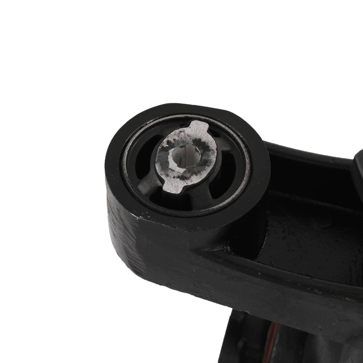 Rear differential carrier assembly close-up of black rubber bushing and mounting surface