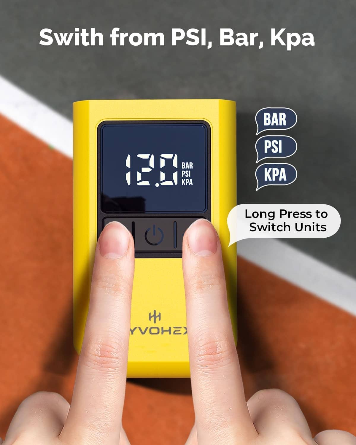 Yellow ball pump with fingers on buttons; screen shows PSI, bar, and KPA options