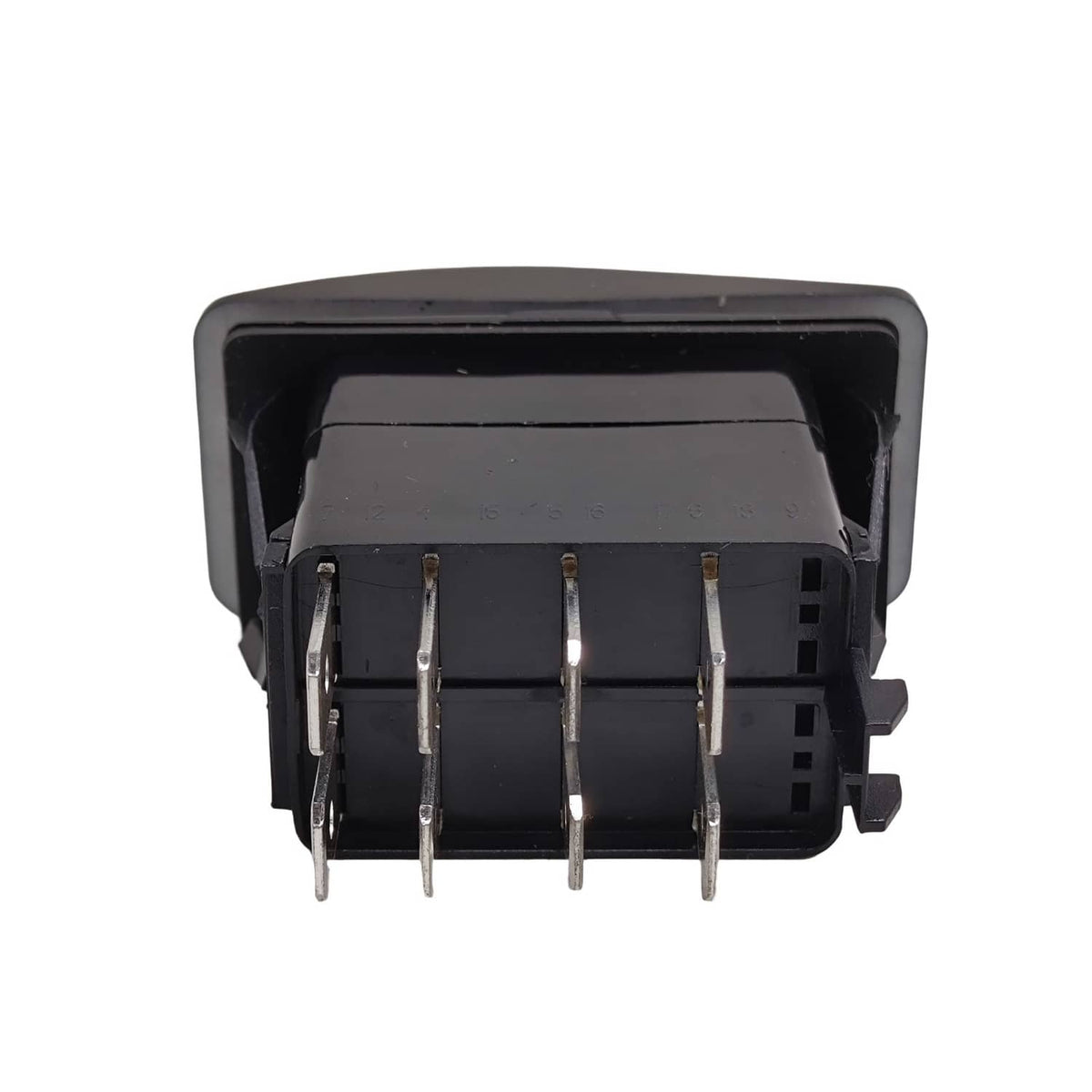 Black window lift switch top view with exposed pins and gray connector