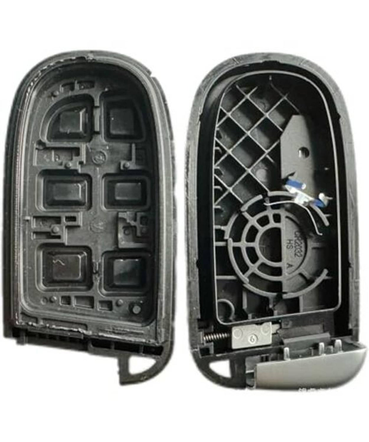 Open key fob case showing interior circuit panel and speaker grille