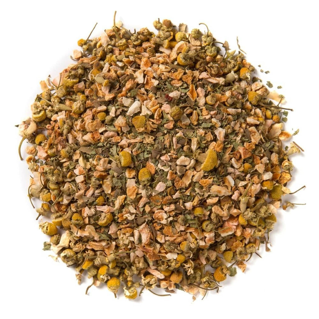 Loose leaf herbal tea blend, mixed dried herbs and petals in a heap