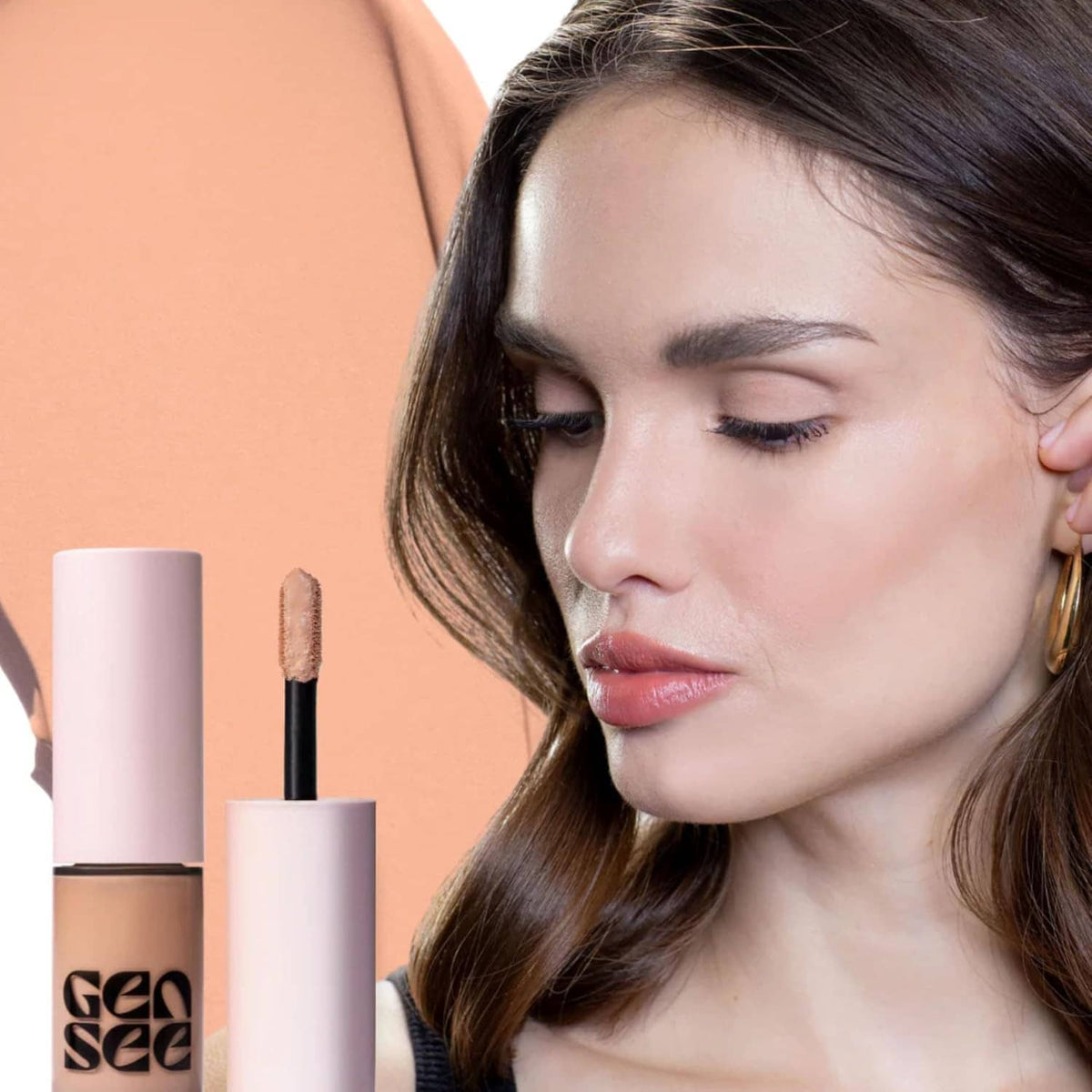 Woman applying rose-gold shimmer liquid eyeshadow with small blending brush to lids