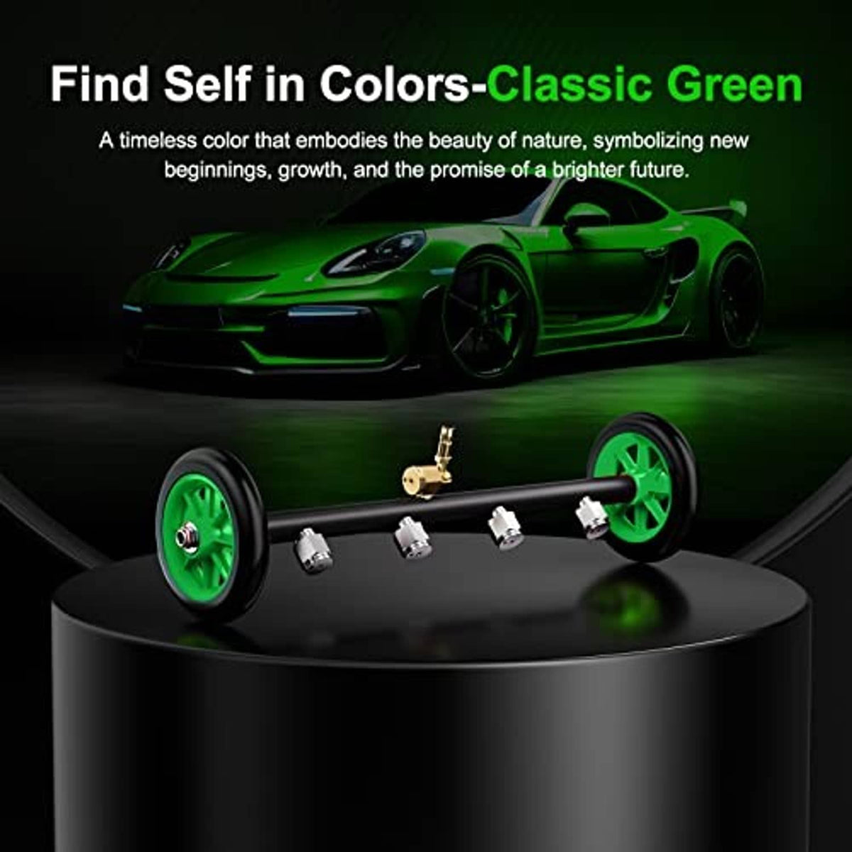 Undercarriage pressure washer attachment with black bar, green wheels, and brass nozzle fittings