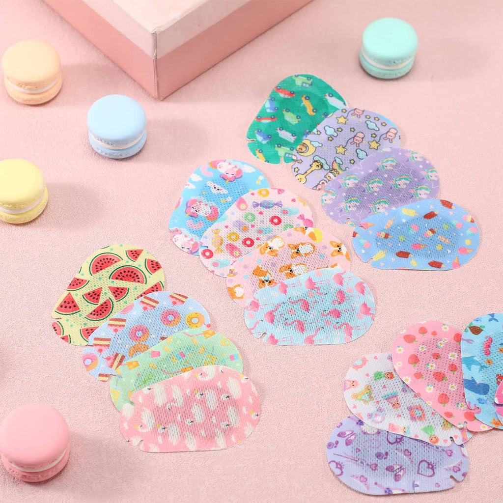 Assorted oval kids adhesive eye patches in pastel and bright prints, laid out