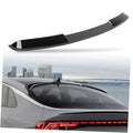 Glossy black roof spoiler mounted on a Kia K5 sedan roof