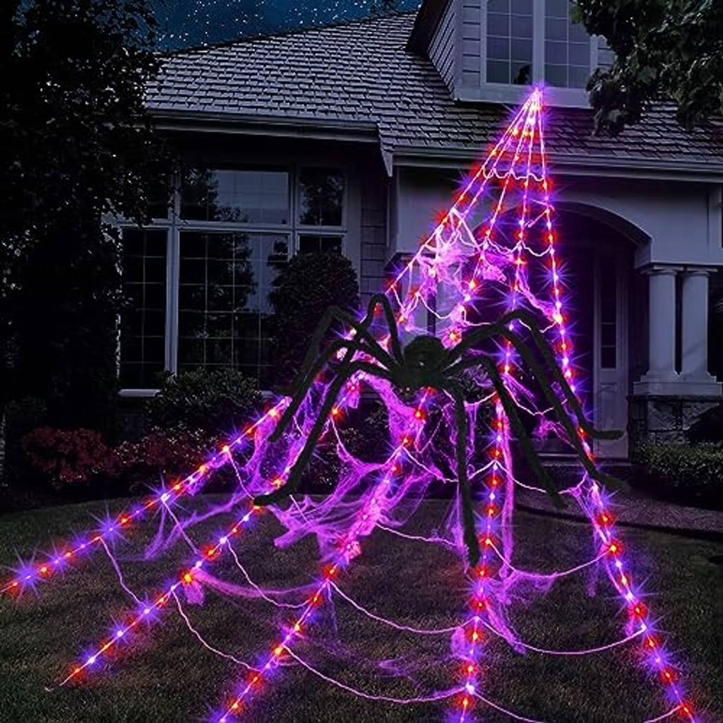 Black spider and illuminated spider web string lights with purple and pink LED lines