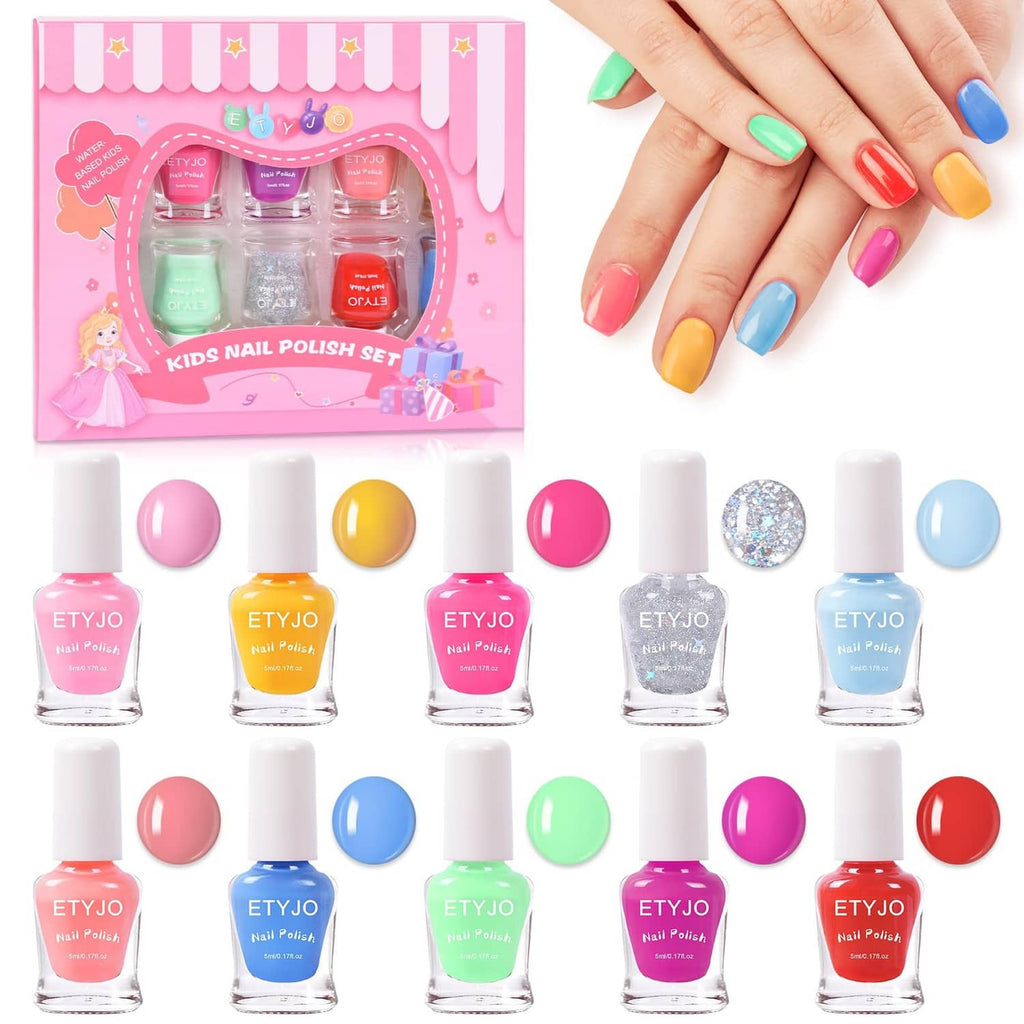 Kids non-toxic nail polish set with rainbow bottles and colorful manicure on hands