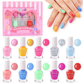 Kids non-toxic nail polish set with rainbow bottles and colorful manicure on hands