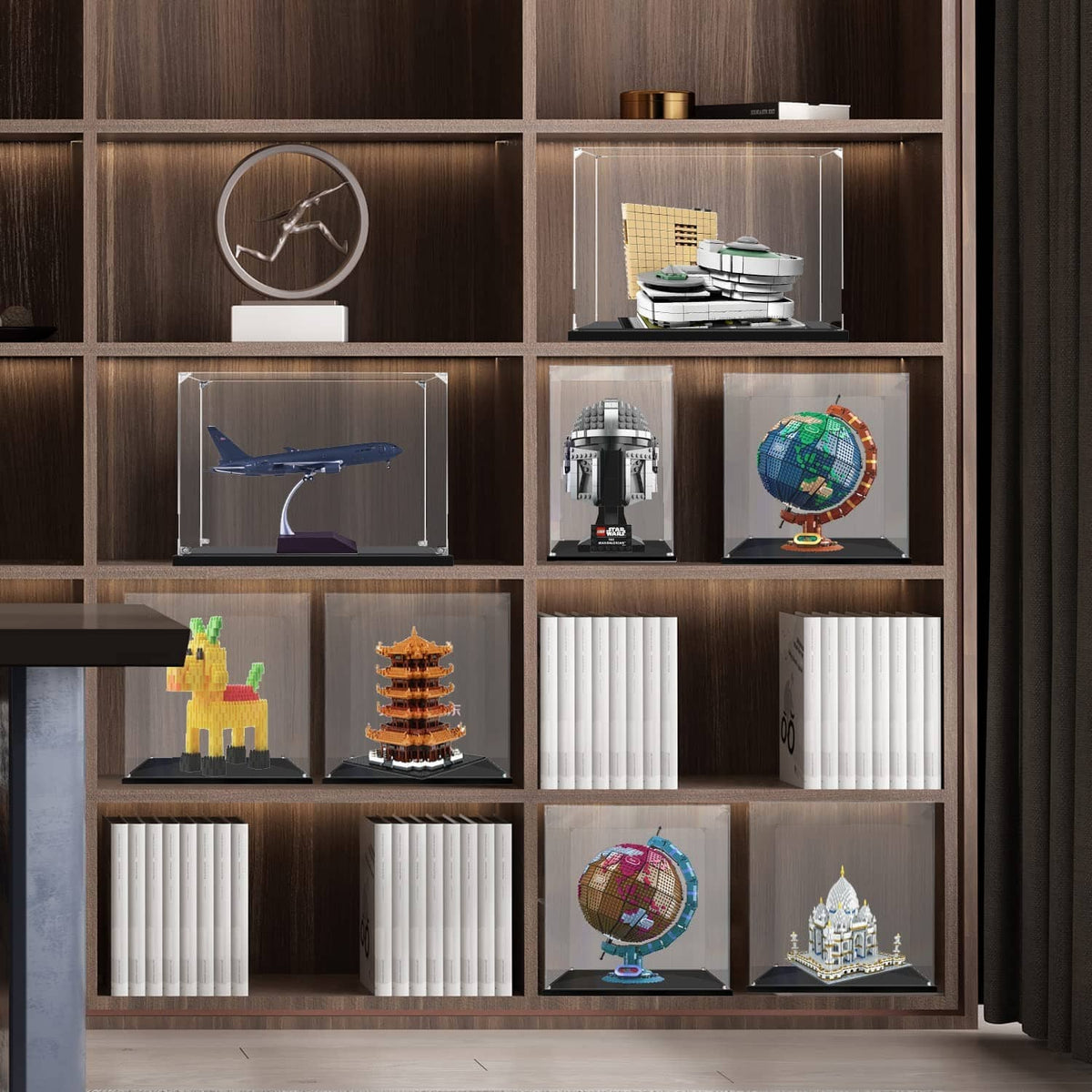 Clear acrylic display case on a shelf, transparent cube for collectibles