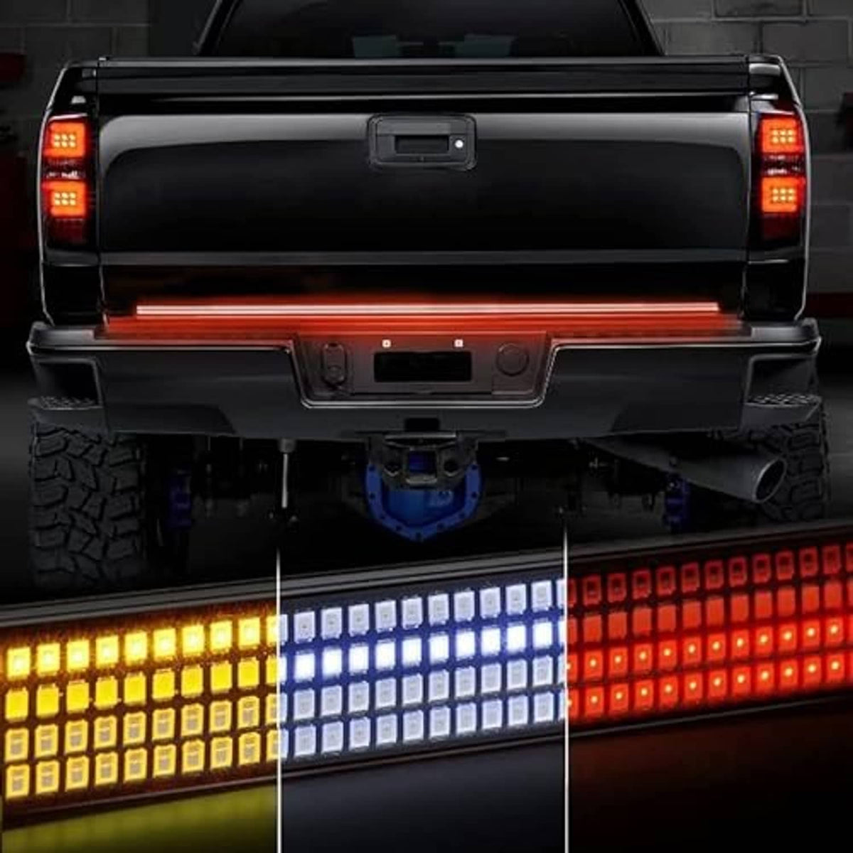 60-inch quad-row LED tailgate light bar on pickup tailgate, amber turn and red/white glow