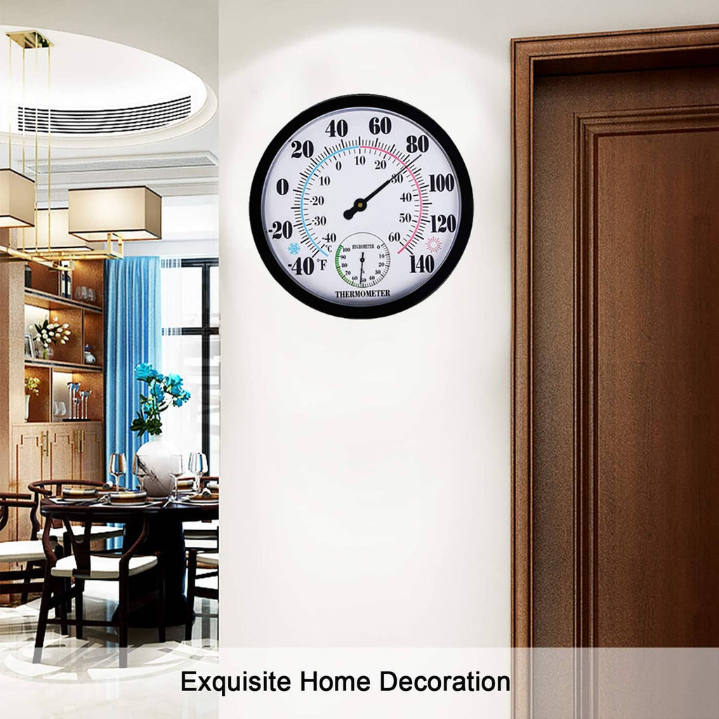 Round black wall thermometer and hygrometer with analog temperature and humidity