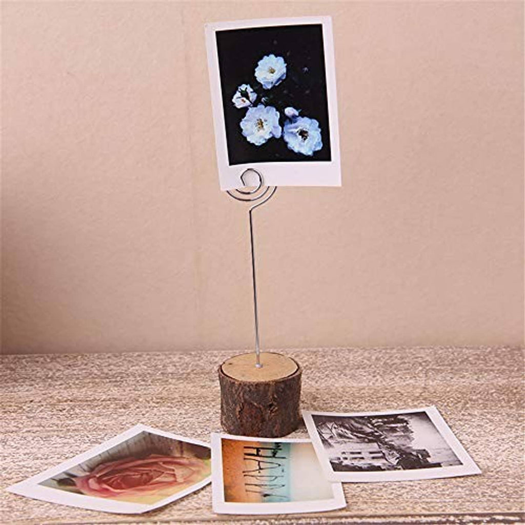 Silver wire card holder with round spiral clip, displaying a small photo card