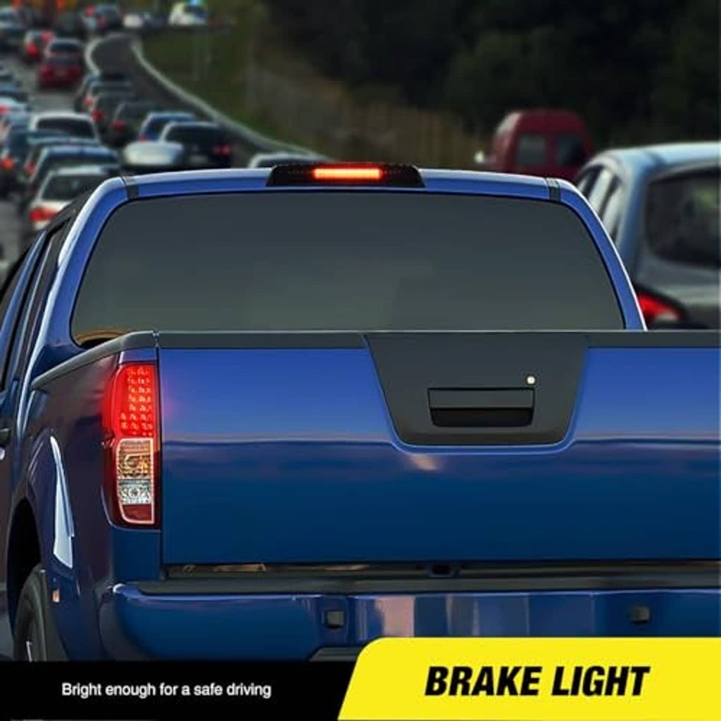 Installed LED high-mount third brake light on truck rear with illuminated red lens