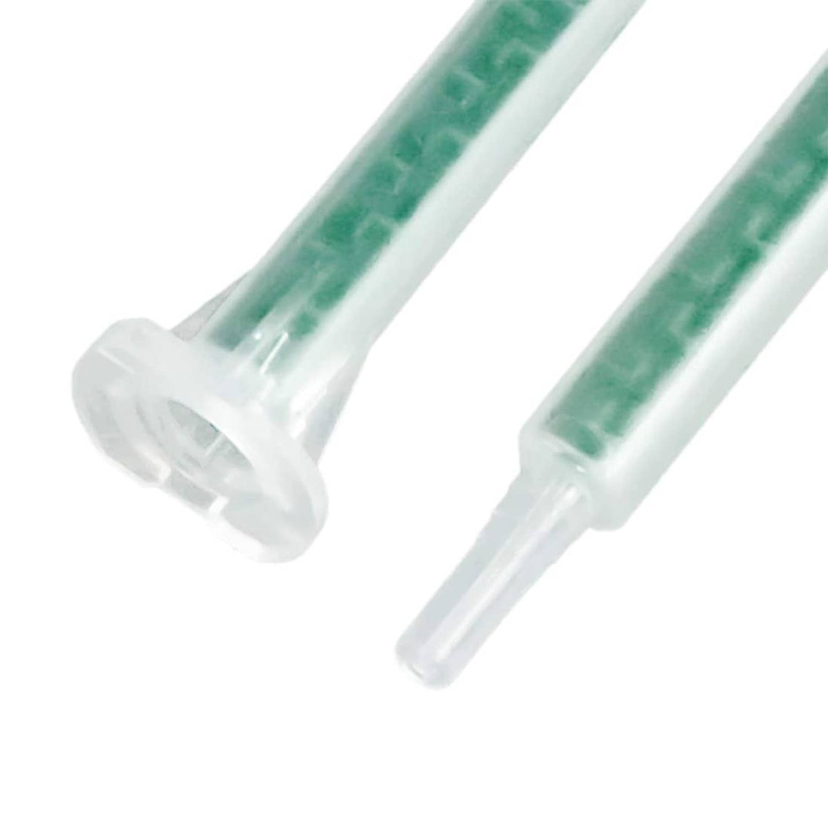 Close-up static mixer nozzle tips, clear plastic with green internal channels