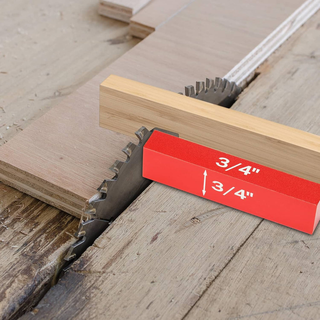Red aluminum height gauge block clamped to a wooden board for setup
