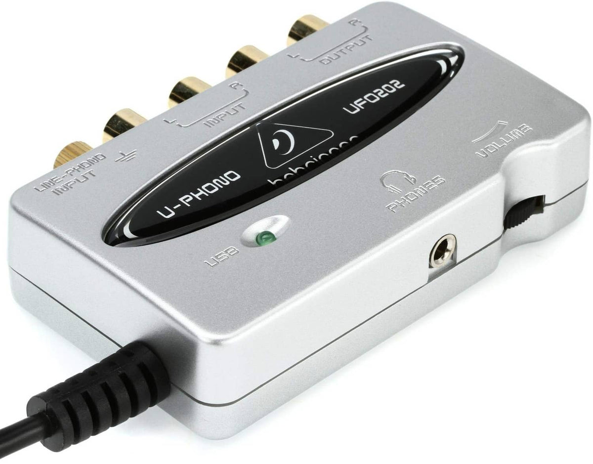 Silver audiophile USB audio interface with black top panel and headphone jack ports