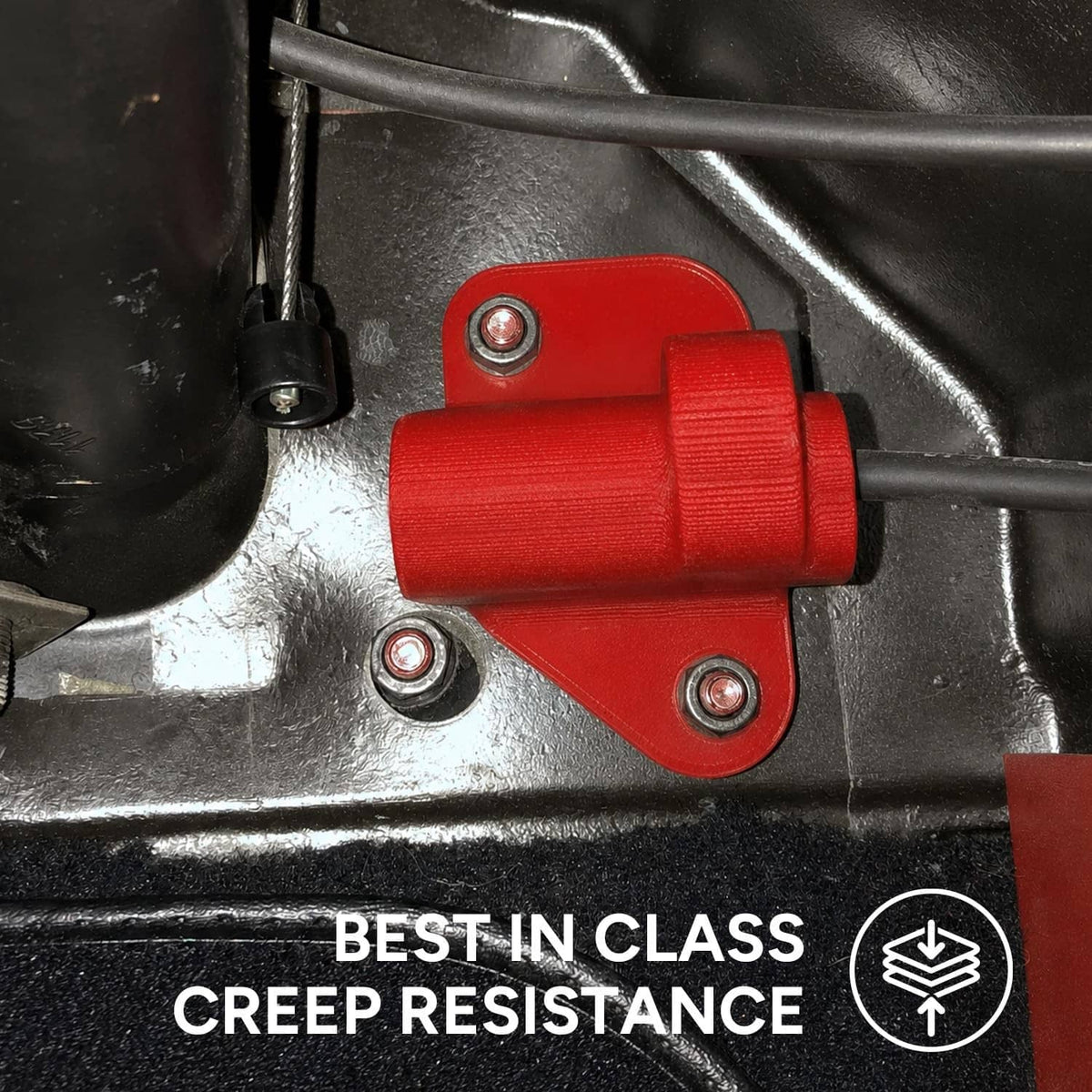 Red filament feed into 3D printer extruder nozzle