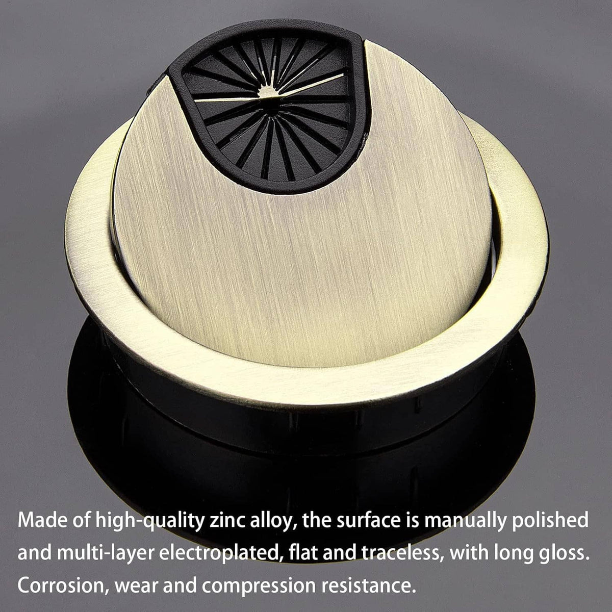 Angled bronze desk grommet with black radial insert cover for wire management