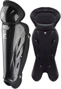 Black single knee leg guard with molded outer shell and padded interior, rivet details