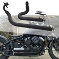 Black motorcycle exhaust pipe system with two-silencer mufflers installed on a V-twin bike.