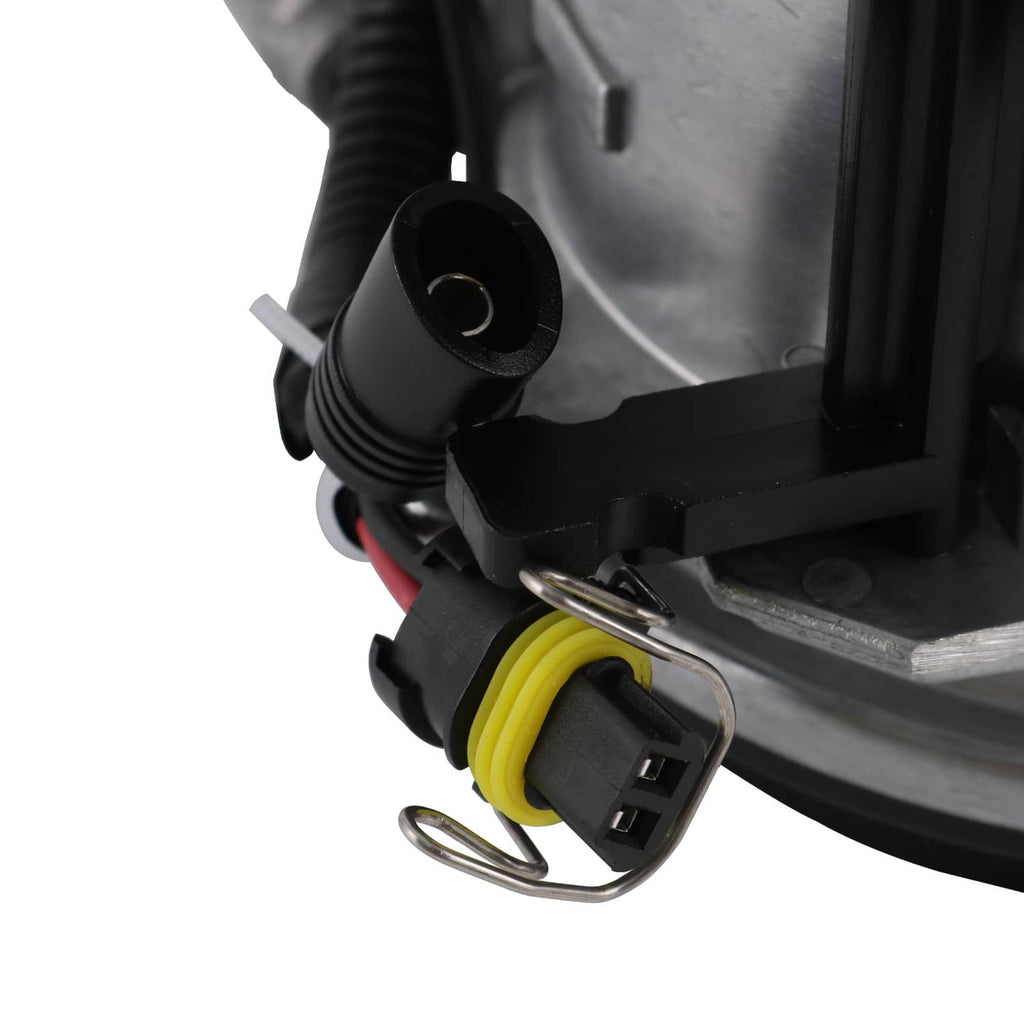 Fuel filter housing assembly close-up of black connector with yellow wire lead