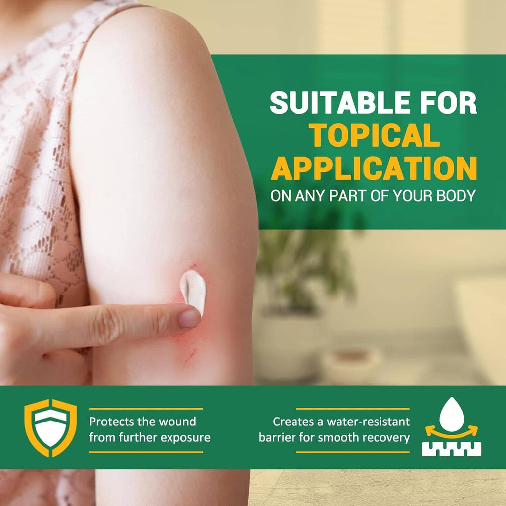Bacitracin zinc antibiotic ointment on small cut on arm, topical application