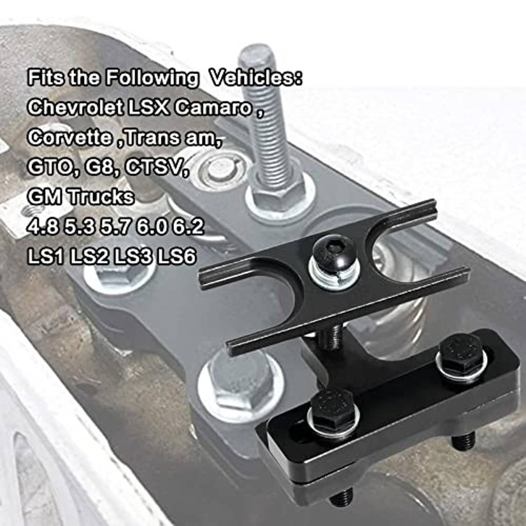 Valve spring compressor tool mounted on engine head, showing screw post and base plate
