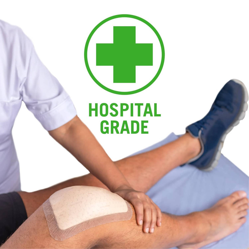 Beige foam border dressing applied to patient skin