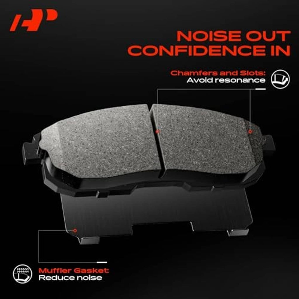 Ceramic brake pads with chamfers and slots for reduced noise and resonance