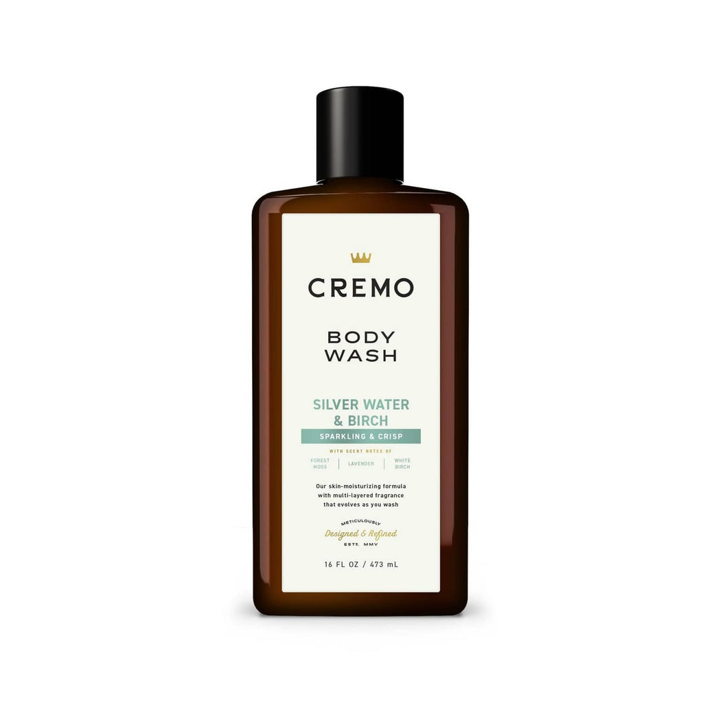 Cremo body wash bottle with Silver Water & Birch front label, amber bottle, black cap