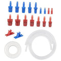 Brake bleeder kit with assorted blue and red fittings, clips, and white tubing