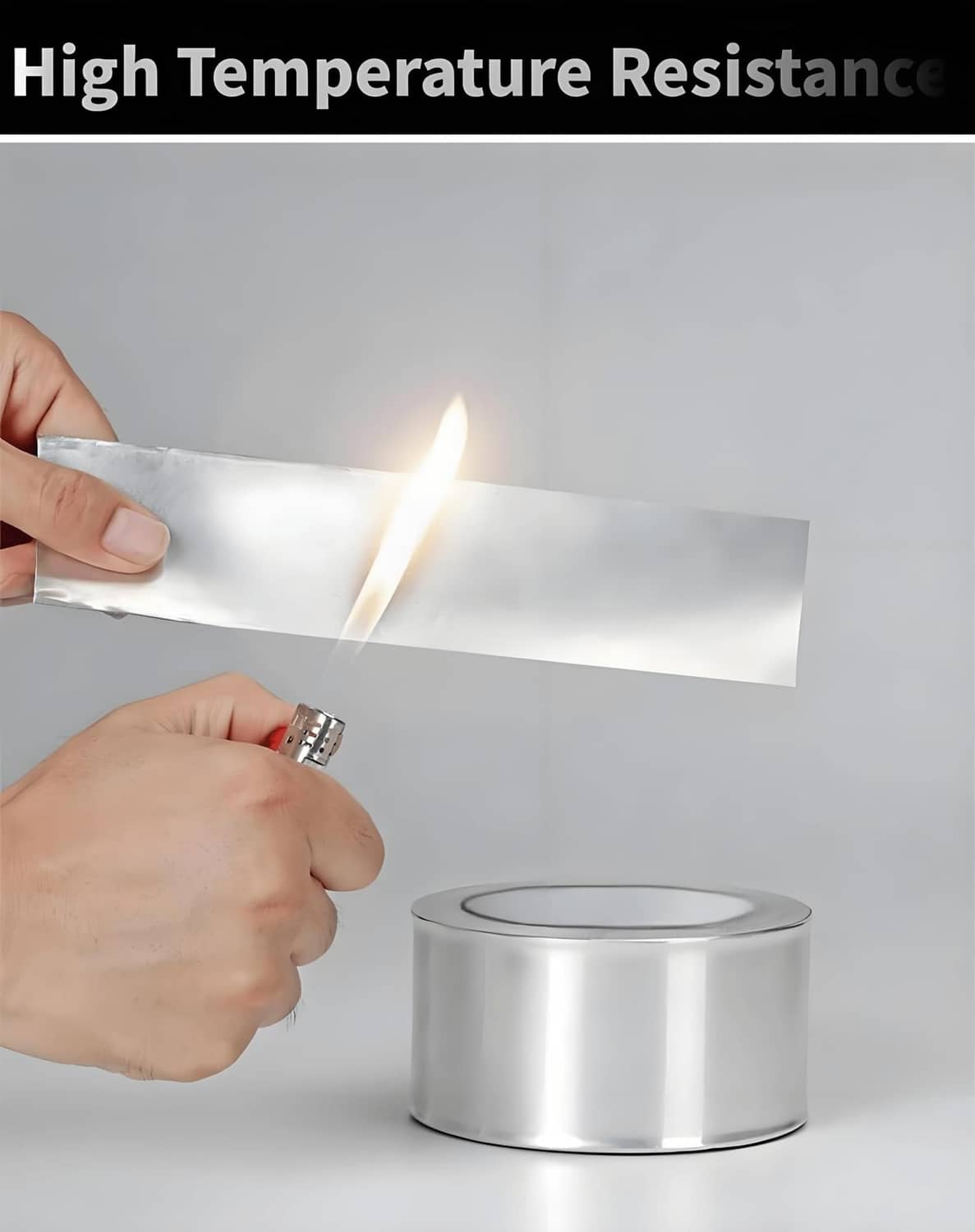 Silver aluminum foil tape strip held near a flame; high-temperature resistant coating