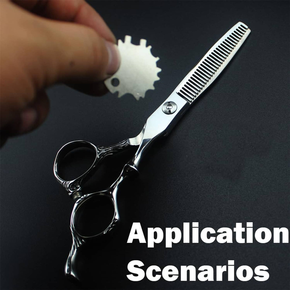 Close-up of silver scissors with a silver tension adjuster key disc