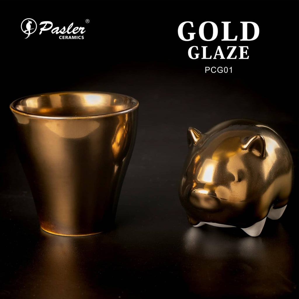Gold-glazed ceramic cup and small lidded piece with mirror metallic finish