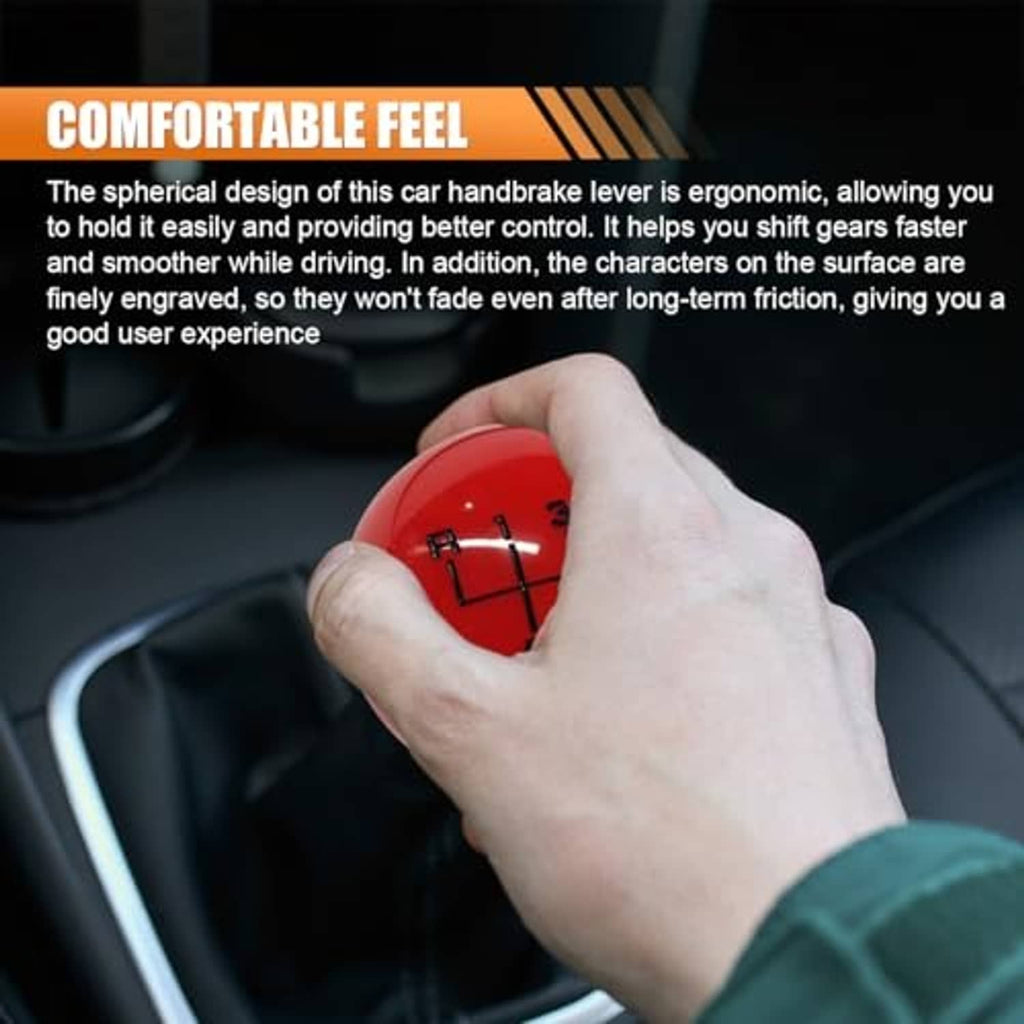 Red 6-speed gear shift knob with numbered grid, shown being held by a hand