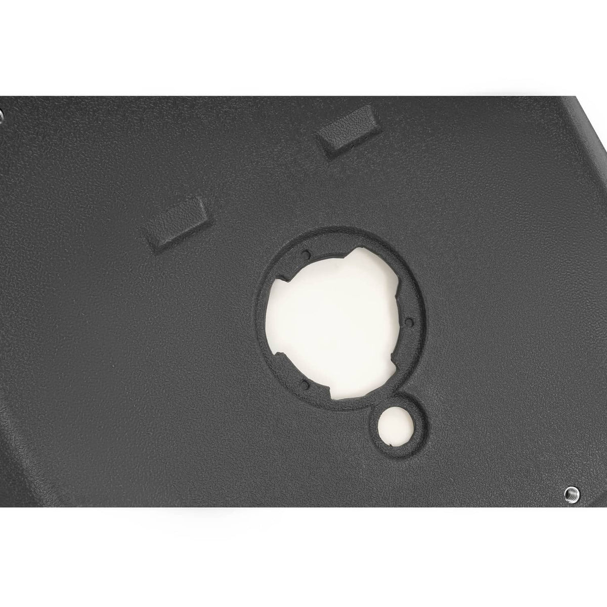 Close-up of black seat base mounting opening and small fastener holes