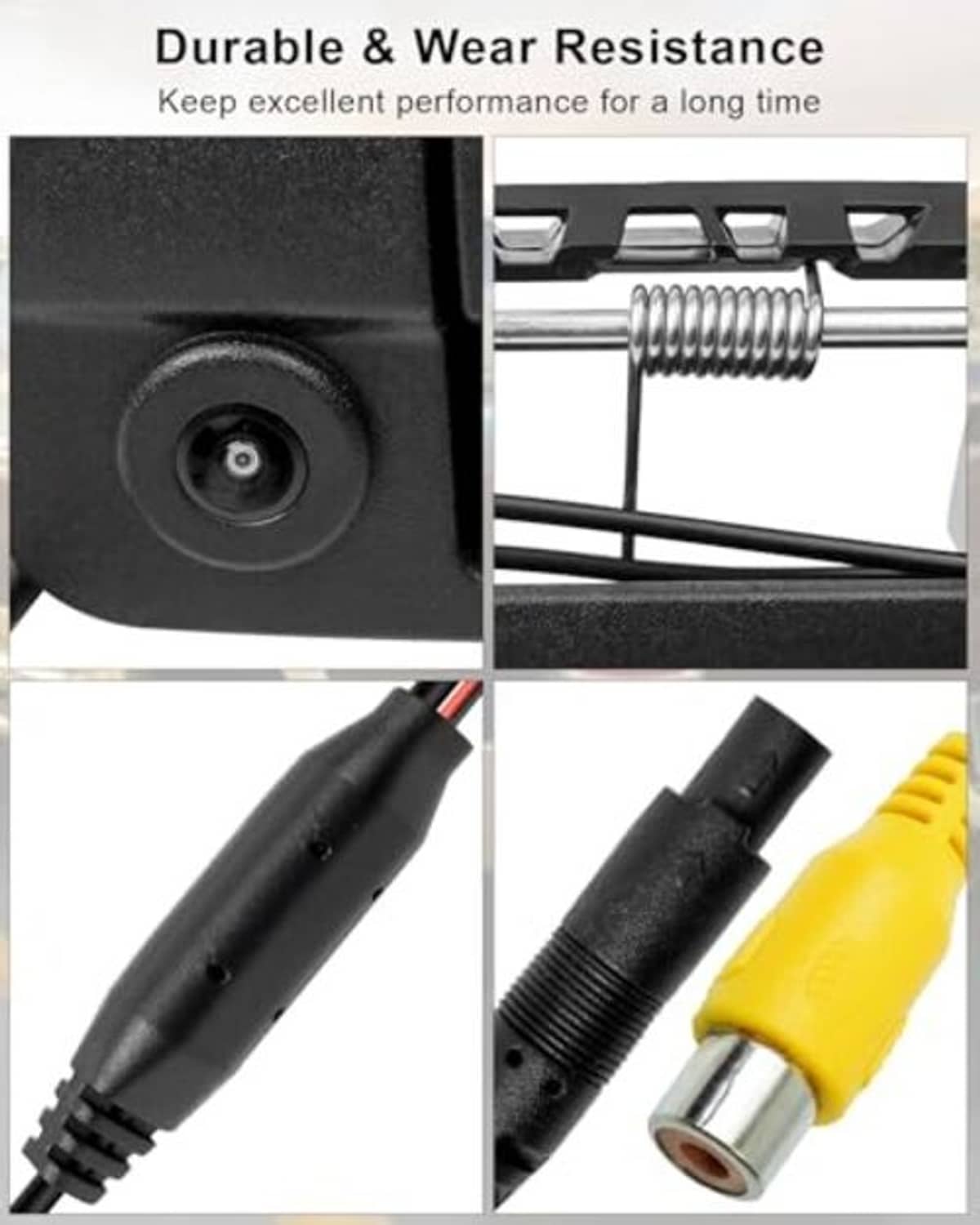 Tailgate handle backup camera close-up with black lens module and metal spring bracket