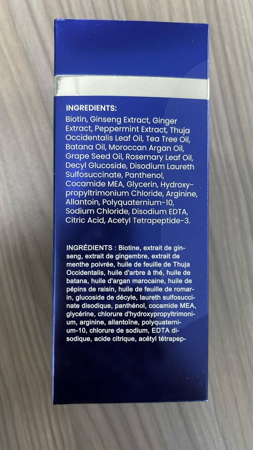 Men's hair growth shampoo box back ingredients list on blue panel