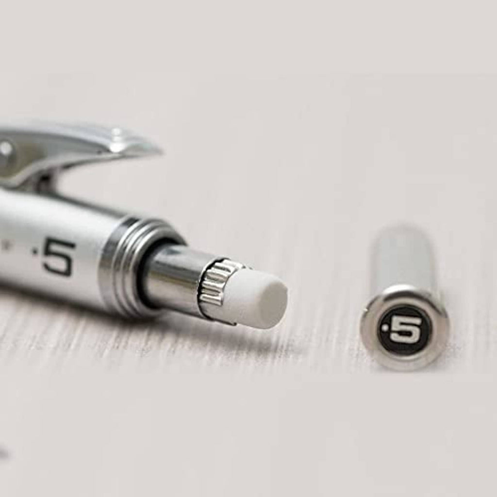 Close-up of retractable lead sleeve and textured adjustment ring near pencil tip